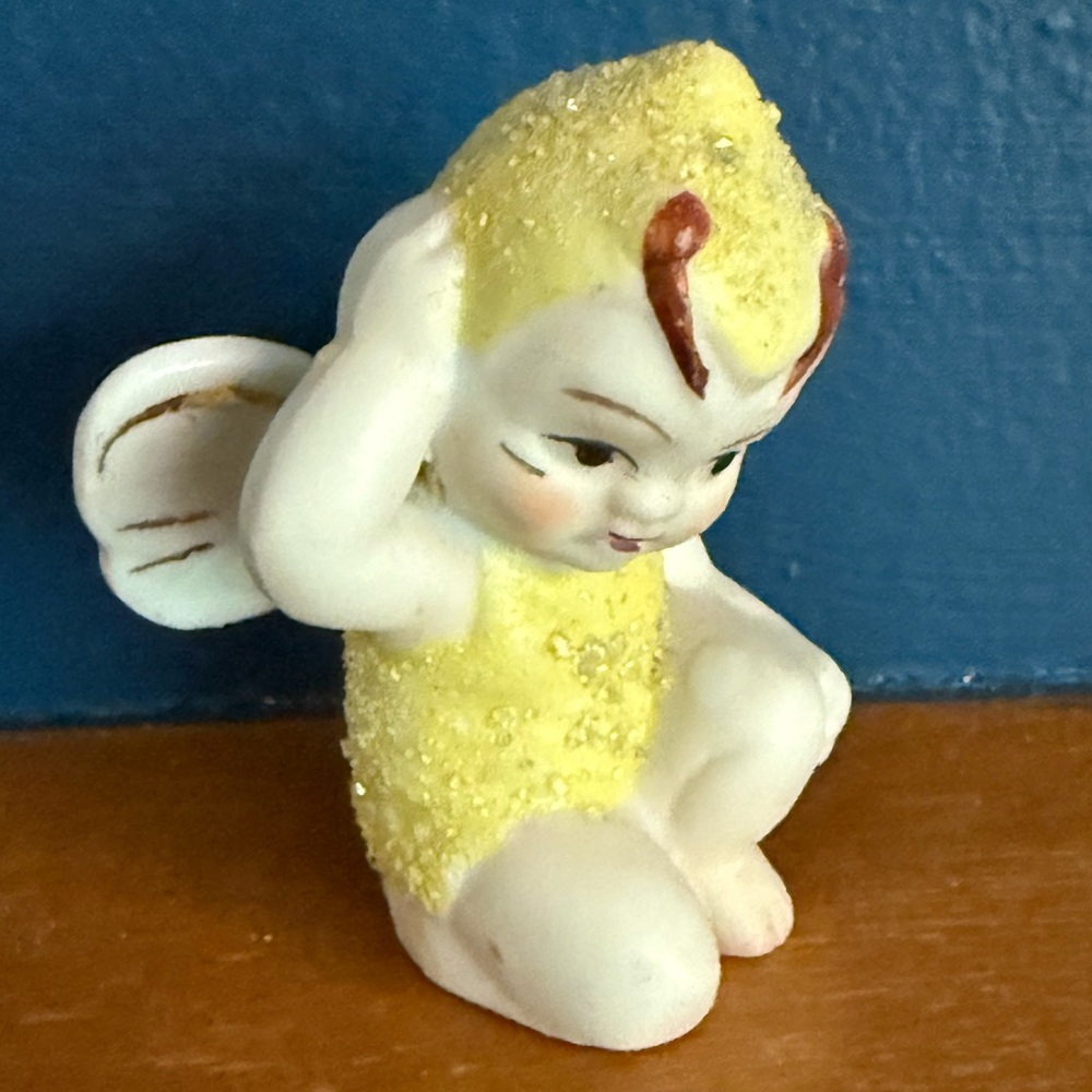 Vintage Yellow Sugar Baby Pixie Figurine